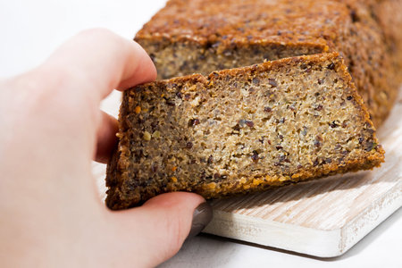 piece of homemade bread with quinoa, closeupの写真素材