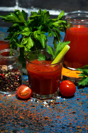 healthy tomato juice with salt and celery, top viewの写真素材