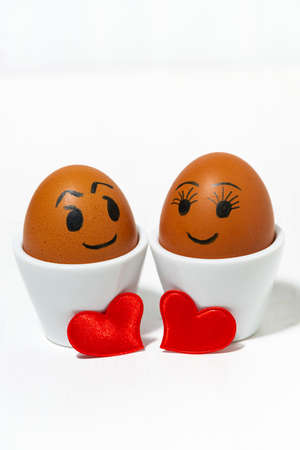 eggs, couple in love, conceptual photo on white background, top viewの写真素材