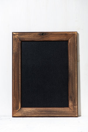 black board for writing recipes on white background, vertical closeupの写真素材
