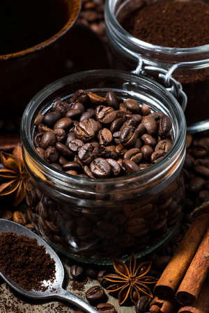 roasted coffee beans, spices and sugar, vertical closeupの写真素材
