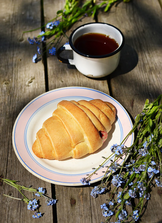 Ð¡roissants on old wooden tableの写真素材