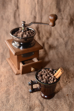 Coffee in a coffee grinder on sackingの写真素材
