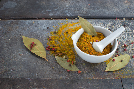 Indian spices curry on grunge abstract backgroundの写真素材