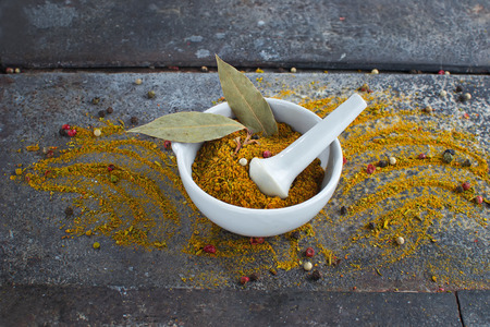 Indian spices curry on grunge abstract backgroundの写真素材