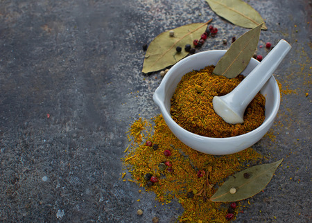 Indian spices curry on grunge abstract backgroundの写真素材