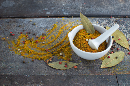 Indian spices curry on grunge abstract backgroundの写真素材