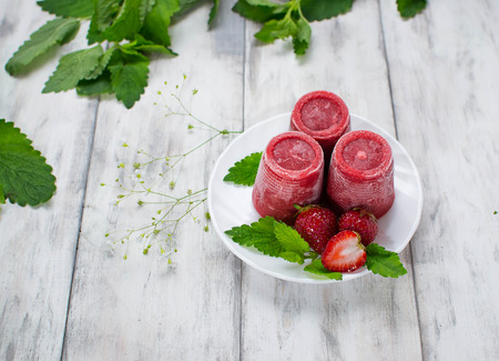 Strawberry Ice Cream on light wooden  backgroundの写真素材