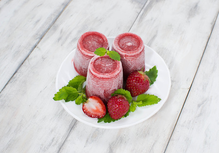 Strawberry Ice Cream on light wooden  backgroundの写真素材