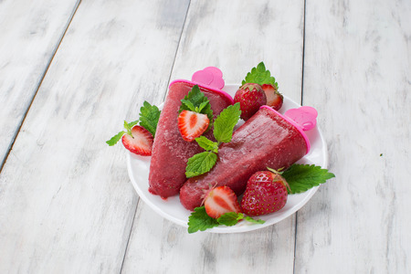 Strawberry Ice Cream on light wooden  backgroundの写真素材