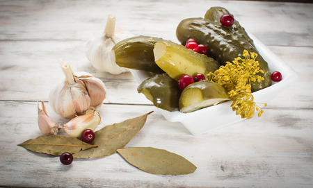 Pickled homemade cucumbers with cranberriesの写真素材