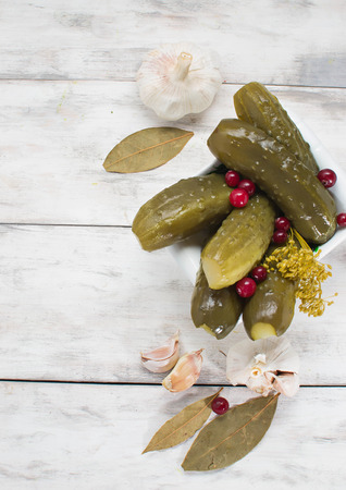 Pickled homemade cucumbers with cranberriesの写真素材