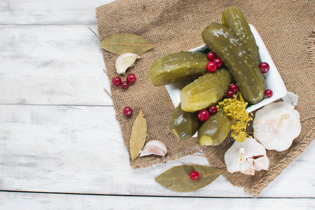 Pickled homemade cucumbers with cranberriesの写真素材