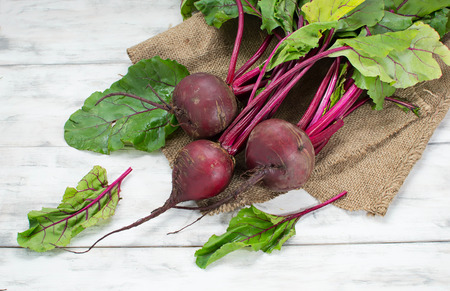 Beetroots on light  wooden backgroundの写真素材