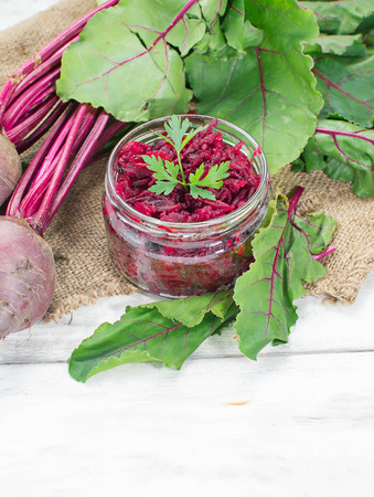 Pickled  beetroot in a jar on light backgroundの写真素材