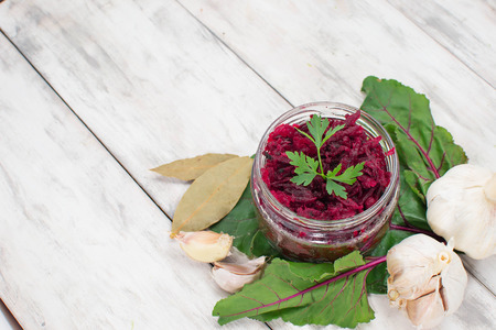 Pickled  beetroot in a jar on light backgroundの写真素材