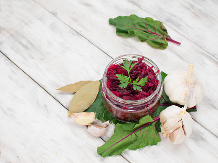 Pickled  beetroot in a jar on light backgroundの写真素材
