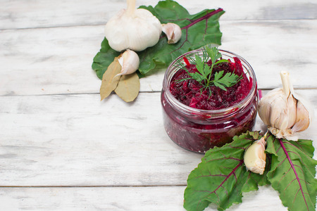 Pickled  beetroot in a jar on light backgroundの写真素材