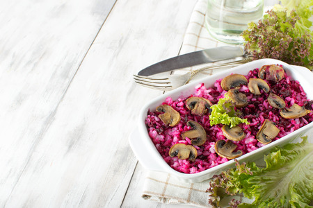 Risotto with mushrooms and beetroot, copyspace compositionの写真素材