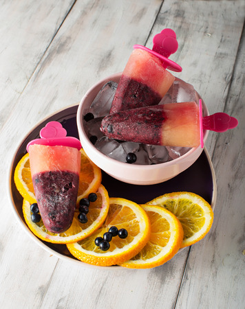 Homemade i%u0441%u0435 cream with blueberries and orangeの写真素材