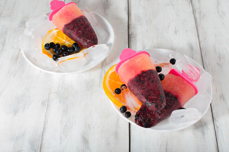 Homemade i%u0441%u0435 cream with blueberries and orangeの写真素材