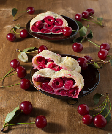 Homemade cherry strudel on paper napkinの写真素材