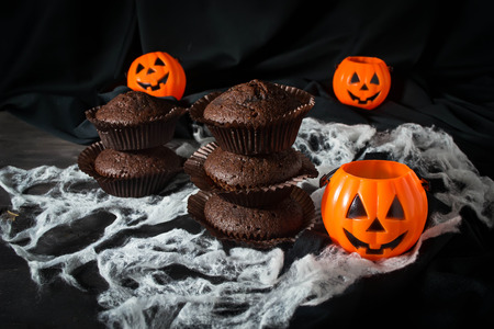 Halloween chocolate cupcake with jack-o-lanternの写真素材