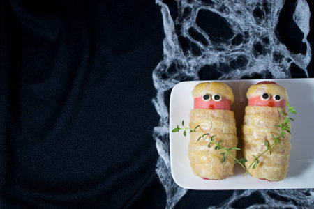 Halloween sausage in the dough decorated to look like mummies の写真素材