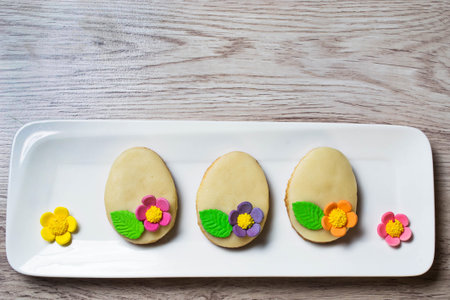 Easter homemade cookie in shape of egg. Selective focus. Space for text