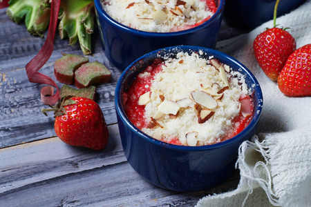 Homemade crumble with strawberry and rhubarb. Selective focusの写真素材