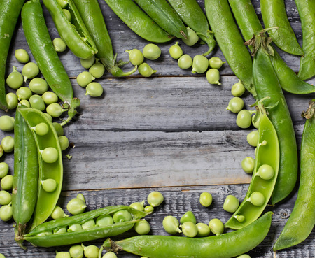 Opened green pea pods. Selective focusの写真素材