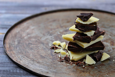 Pieces of dark and white chocolate. Selective focusの写真素材