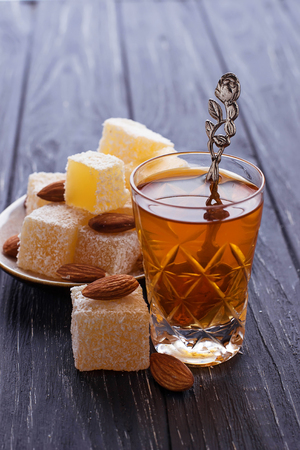 Traditional Turkish delight and tea. Selective focusの写真素材