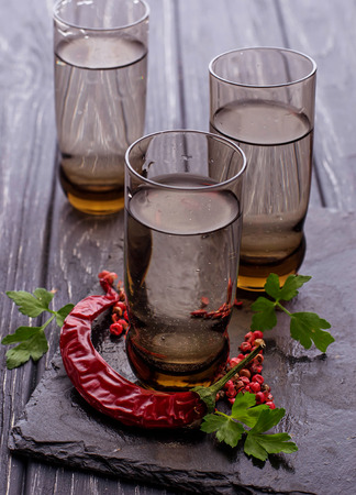 Vodka and chilli pepper. Selective focusの写真素材