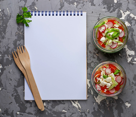Salad with cabbage, radish and feta in jar. Selective focusの写真素材
