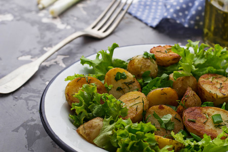 Salad with potato, parsley, dill and lettuce. Selective focusの写真素材