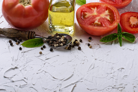 Ripe tomato, basil and olive oil. Selective focusの写真素材