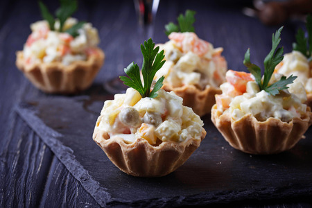 Tartlets with Russian salad, festive appetizer. Selective focusの写真素材