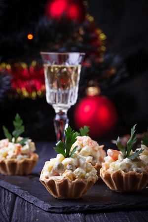 Tartlets with Russian salad, festive appetizer. Selective focusの写真素材