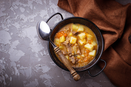 Stewed beef with potatoes, carrot and pumpkin. Selective focusの写真素材