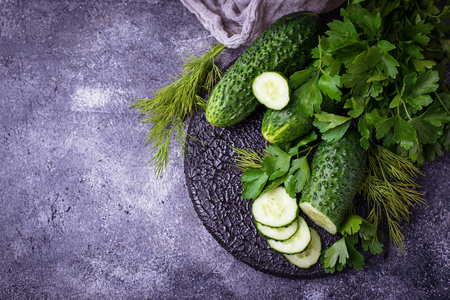 Fresh sliced cucumber and parsley. Selective focusの写真素材