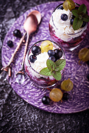 Healthy dessert with berry and cream cheese. Selective focusの写真素材
