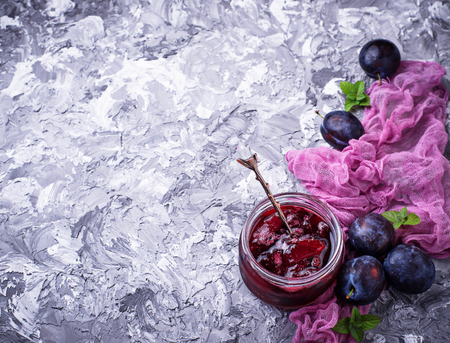 Jar with plum jam. Top viewの写真素材