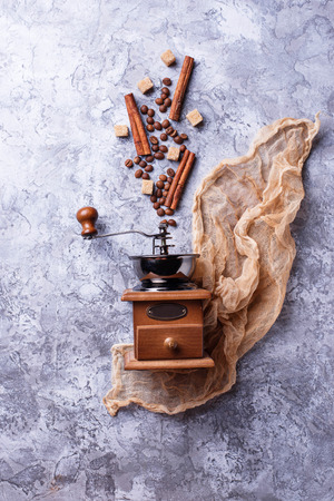 Creative coffee background with beans, sugar and cinnamon. Flatlay style. Top viewの写真素材