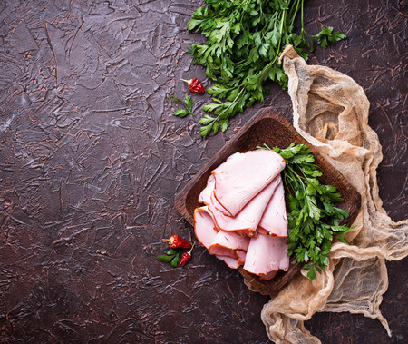 Sliced ham with spices. Top viewの写真素材