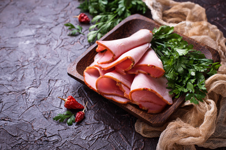 Sliced ham with spices. Selective focusの写真素材