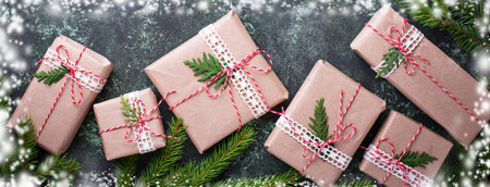 Christmas gift boxes in craft paper.の写真素材
