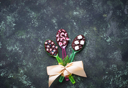 Spoons with chocolate. Christmas presentの写真素材