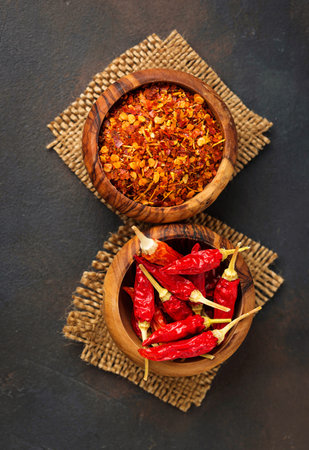 Red hot chili peppers on rusty background. Top viewの写真素材