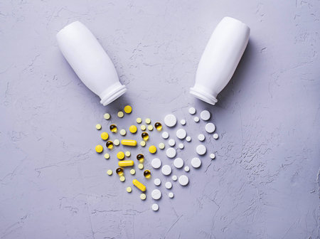 Different pills, tablets and capsules. Assorted of medicinesの写真素材